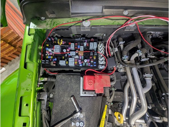 The two red wires from the ARB power harness will attach directly to the fuses in the fused lead. Trim the wires to length, strip, and crimp an ARB provided ring terminal on each wire. Connect each of these wires to the fused lead.