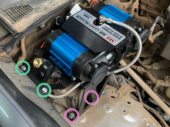 Install the Compressor Bracket Assembly using the two bolts for the ABS Module and the inner fender bracket installed earlier.