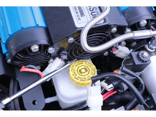 Torque the new M8 fender bolt to 27 lb-ft [37 Nm]