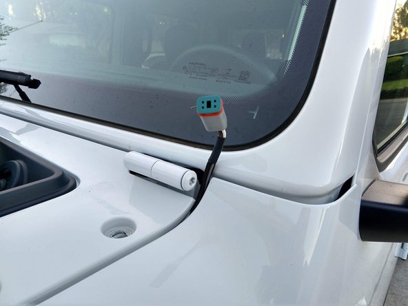 We recommend placing a soft cloth or towel over the center cowling, and then placing the lights and brackets on the center cowling while routing the wiring.