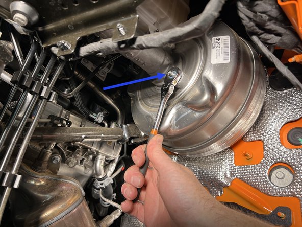 Remove the lower master cylinder nut with a 13mm socket or wrench and install the mounting bracket assembly onto the lower MC stud and the two firewall studs with the previously installed Grimm OffRoad spacer.