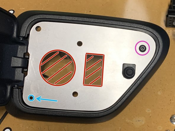 A new mounting hole needs to be added to the lower left of the Charge Port Housing.