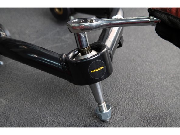 Place the domed top cap on top of the uniball and thread in a 12 point 1/2-20 cap screw.