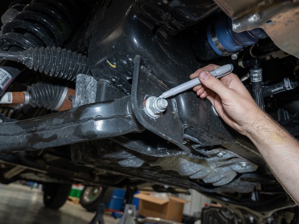 Mark the lower control arm bolt position before removing to make sure they are reinstalled in the same position.