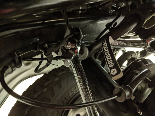 Install the new the new Grimm OffRoad brake line at the caliper using two new copper washers, one on each side of the banjo fitting, at the caliper bolt.