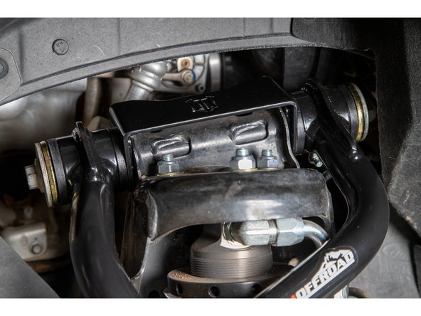 Install the Grimm OffRoad Upper Control Arms onto the vehicle. Note the orientation of the arms, the uniball should be closer to the rear of the vehicle.