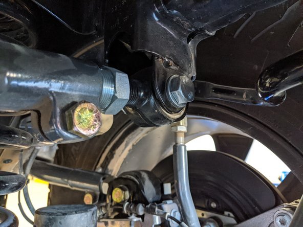 Make sure to hold onto the track bar so it doesn't drop out of the bracket.