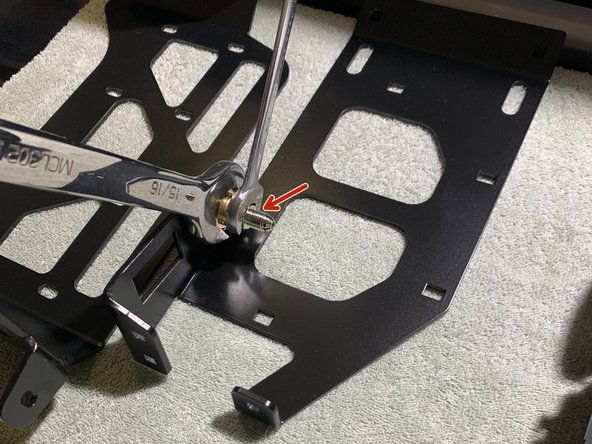 Install the straight 1/4” NPT x JIC4 fitting into the back of the bulkhead fitting on the PCM Mounting Bracket Assembly using a 9/16&quot; open end wrench. Use thread sealant on the NPT threads.