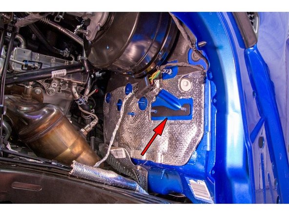 Remove the lower master cylinder nut with a 13mm socket or wrench.