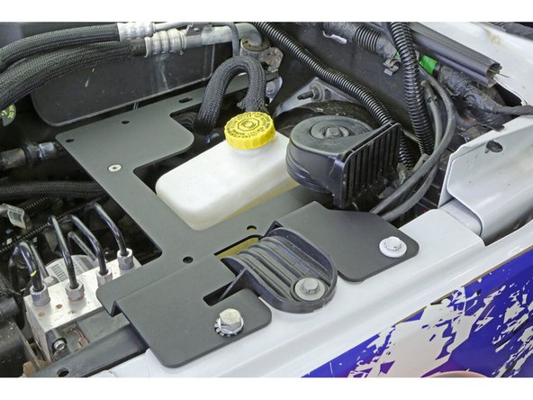 Install the M6 x 25mm flat head screw through the compressor mount and the compressor mount gusset. Install the M6 nylock nut on the backside and use a 10mm wrench and 4mm hex bit to snug up the screw (do not fully tighten yet).