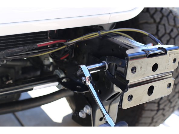 Apply threadlocker to the six provided M10x1.5 x 35mm bolts.