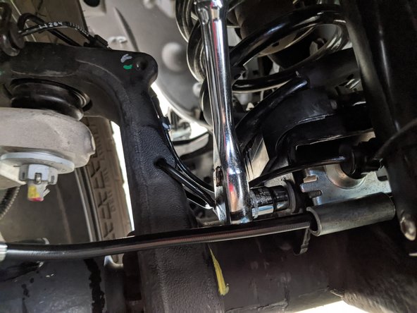 Attach the wheel speed sensor line to the brake line axle bracket using the retaining clips and new zip ties if they were cut.