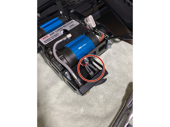 Plug the wires from the Grimm OffRoad supplied switch wire harness into the back of the ARB compressor switch. The BLACK wire goes to the top terminal, the RED wire goes to the center terminal and the PURPLE wire goes to the lower terminal.