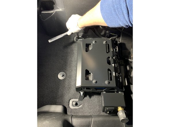 Install the Compressor Bracket Assembly into the vehicle using the rear seat mount bolts with an E12 Torx socket. Tighten snugly, but don't torque yet as they will need to be removed again before reinstalling the seat.