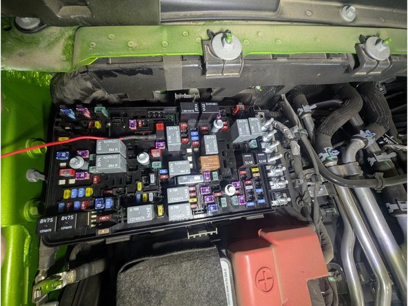 Reinsert the yellow 20A fuse into the bottom location on the fuse tap and place the provided red 10A fuse into the top location.