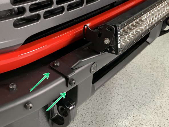 Install the light bridge to the bumper with the screws removed earlier.