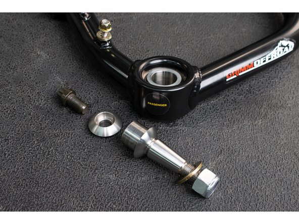 Install the taper adapter up from the bottom into the uniball. The tapered pin should point down, towards the spindle.