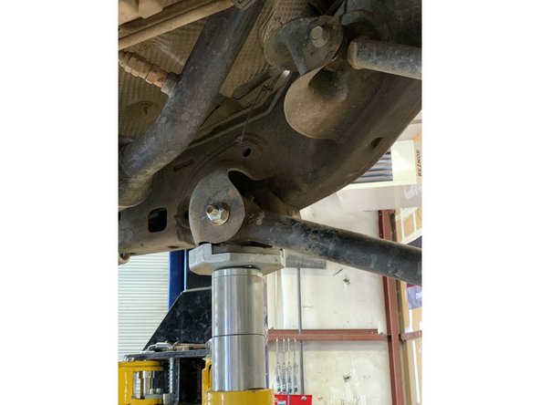 Repeat for all four bolts on both front lower control arms.