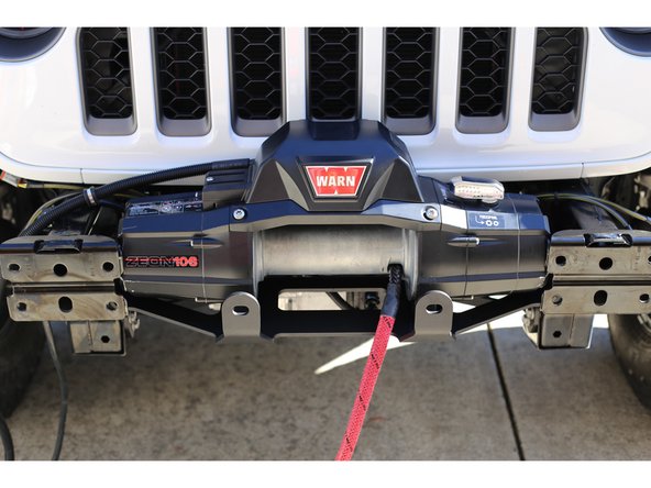 Depending on the winch being used, the bumper mounting plates may need to be trimmed slightly for the winch to fit.