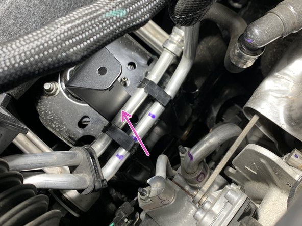 If rubbing looks like it could be a concern, a zip tie can be installed here to prevent the coolant line from contacting the support bracket.