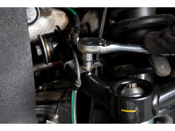 A second option is to remove the control arm and pin assembly from the frame and install the tapered pin into the spindle first, then use the leverage from holding the control arm to re-orient the pin and line up the mounts at the frame.