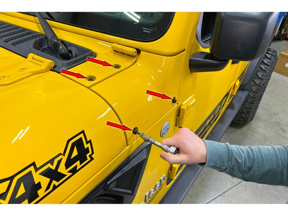 Using a T40 torx driver remove the 4 bolts holding the cowl trim piece on the driver side.