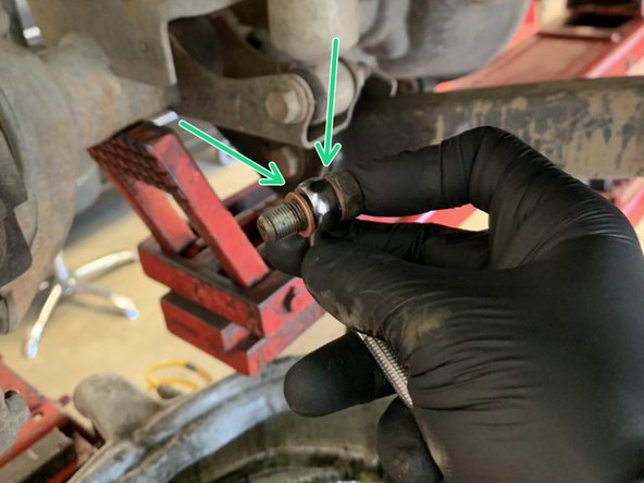 Install the factory banjo bolt in the Grimm OffRoad brake line. Use a new copper crush washer on each side of the brake line fitting.