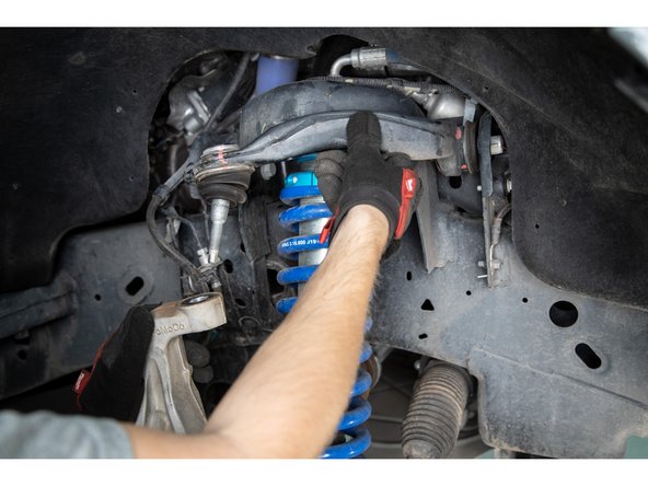 Support the spindle so that it does not over extend the CV joints when detached.