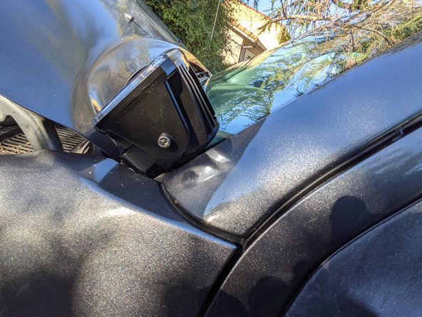 Push on the hood to re-align it properly, then open it back up carefully and tighten the hinge bolts.