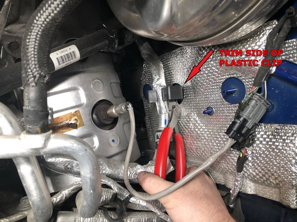 On the firewall, disconnect the wheel sensor and O2 sensor plugs.