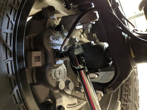 Before completely removing the old brake line, it is helpful to install the new Grimm OffRoad brake line at the caliper first.
