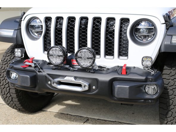 Run winch wiring to the vehicle battery per winch manufacturer's instructions.