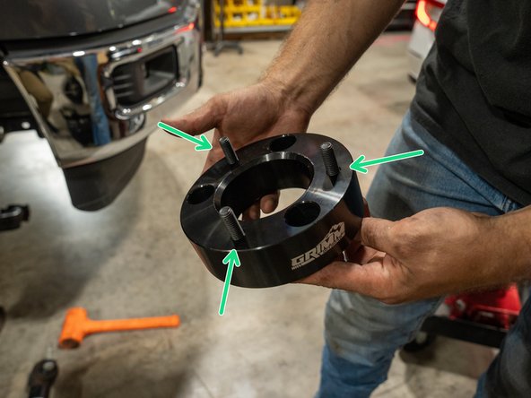 With the provided socket cap screws, install into the Grimm OffRoad spacers from the bottom.