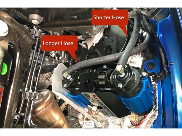Install the supplied filter relocation hoses onto the barb fittings on the compressor. The longer of the two hoses connect to the innermost fitting, the shorter connects to the outer fitting.