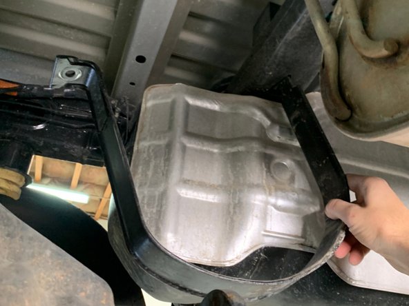 Replace the strap with OE studded strap.