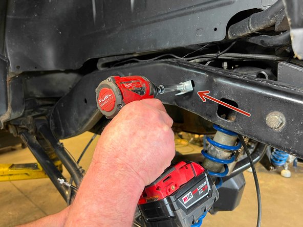 If you are keeping your brake lines in the factory locations on the frame, install a new Grimm OffRoad bracket in place of the stock bracket. Re-use the factory bolt.  Position the bracket so that it is perpendicular to the hard line as shown. Tighten the bolt with a 10mm wrench/socket.