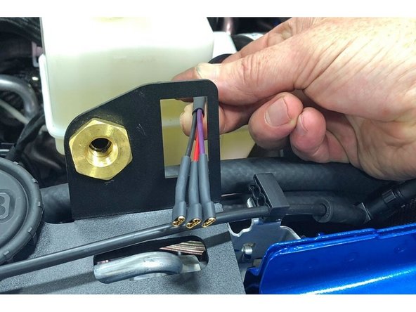 Route the Grimm OffRoad Control Harness through the switch hole in the Controls Plate.