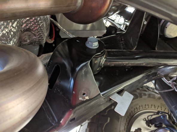 Repeat for both front upper control arm frame side heat shields.