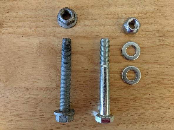 The stock bolts and nuts for the front upper control arms are 18mm.