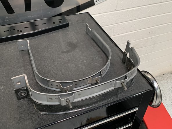 Re-install bolt with 15mm socket/wrench.