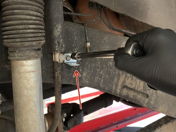Install a new Grimm OffRoad bracket in place of the stock bracket. Re-use the factory bolt.  Position the bracket so that is is parallel to the ground and perpendicular to the hard line. Tighten the bolt with a 10mm wrench/socket.