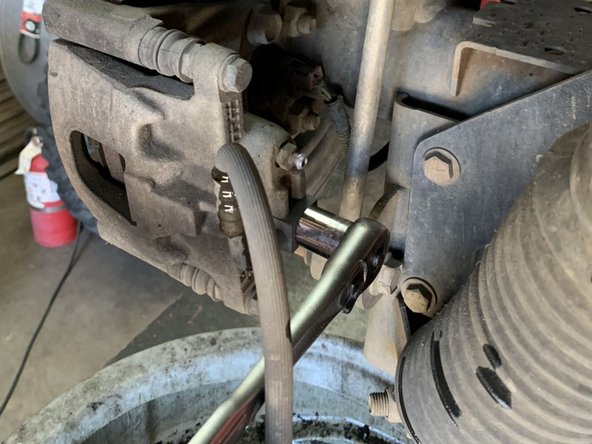 Save the banjo bolt, but discard the factory brake line and crush washers.