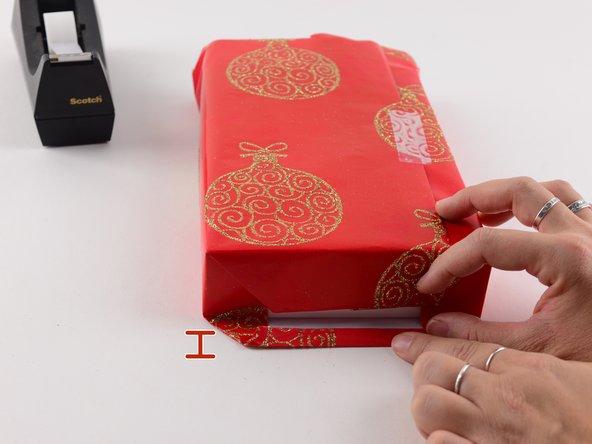 Take the bottom flap and make a small fold, about a quarter of an inch.