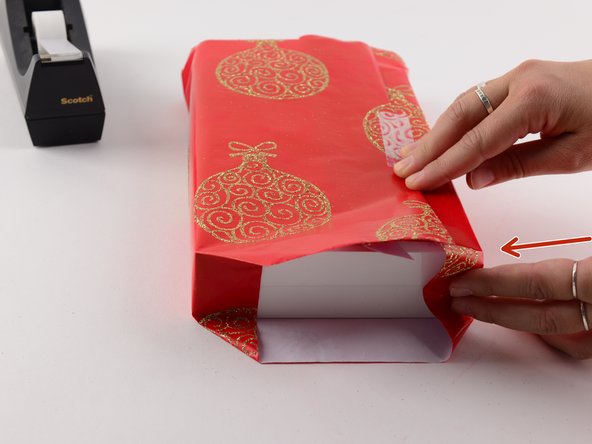 In the first photo, we completed the left side, but allowed the right side to remain unfolded for your comparison.