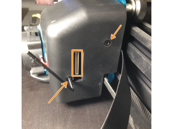 Deconnectez la nappe et desserez les 2 vis