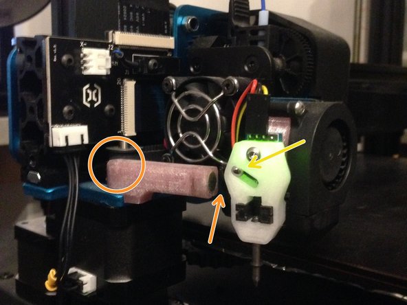 Retirez le support au niveau de la fleche dans la pièce imprimée avant de montez le support d'activation en utilisant une des 2 vis noire de la turbine.( M3x16 mm)