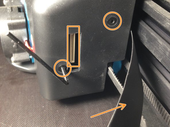 Deconnectez la nappe et desserez les 2 vis