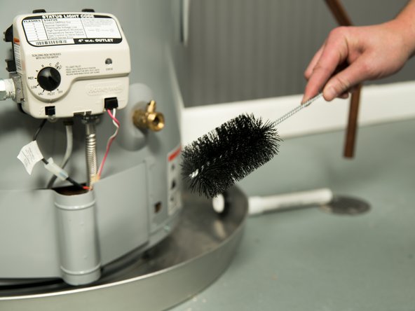 Remove the brush and vacuum off any lint or dust.
