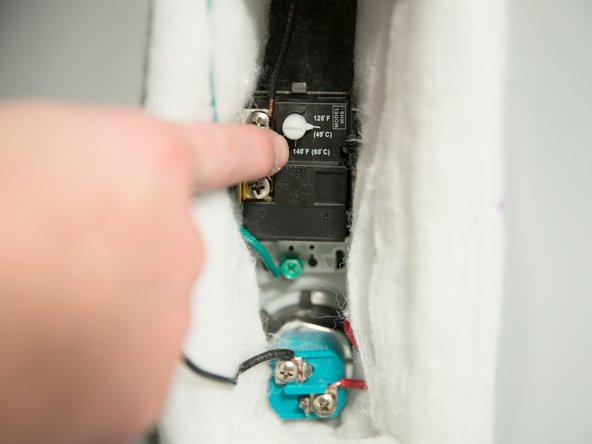 If neither element is shorted, a stuck thermostat is likely the cause of the tripped ECO.