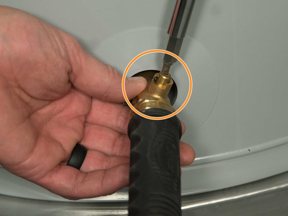 When you're done, close the drain valve and remove the garden hose.